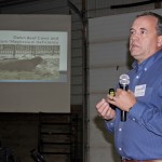 Dr. John Campbell speaking at a veterinarian conference