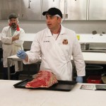 man with a cut of beef