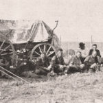 The Ross Ranches' roundup wagon, George Ross shown sixth from the left.