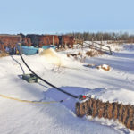The blue trough is on a continuous flow out of a dugout with a timer on 110-volt power.