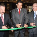 Mexican Agriculture Secretary Enrique Martinez y Martinez, the governor of Sinaloa Mario Lopez and Agriculture Minister Gerry Ritz open the exhibition pavilion at the National Agriculture Outlook Forum in Mexico City. (Photo courtesy Agriculture and Agri-Food Canada)