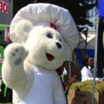 Mexico-based global bakery giant Grupo Bimbo, whose mascot Osito Bimbo is shown here at a company event in Mexico in 2011, has reached an all-cash deal to buy Canada Bread for $1.83 billion. (GrupoBimbo.com)