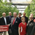 Jeff Leal, Ontario’s minister of agriculture, food and rural affairs (fourth from left), announced the new Greenhouse Competitiveness and Innovation Initiative at a greenhouse in Bowmanville, Ont. (Photo courtesy OMAFRA)