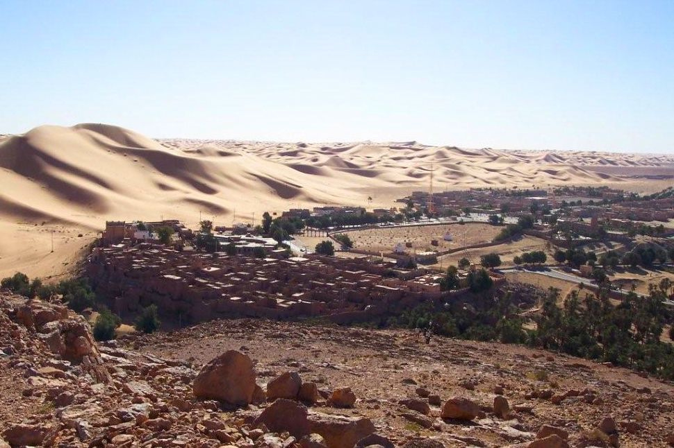 Sahara sand dunes loom over the village of Taghit in western Algeria, about 300 km south of Ain Sefra where snow fell this past week. (CIA.gov)
