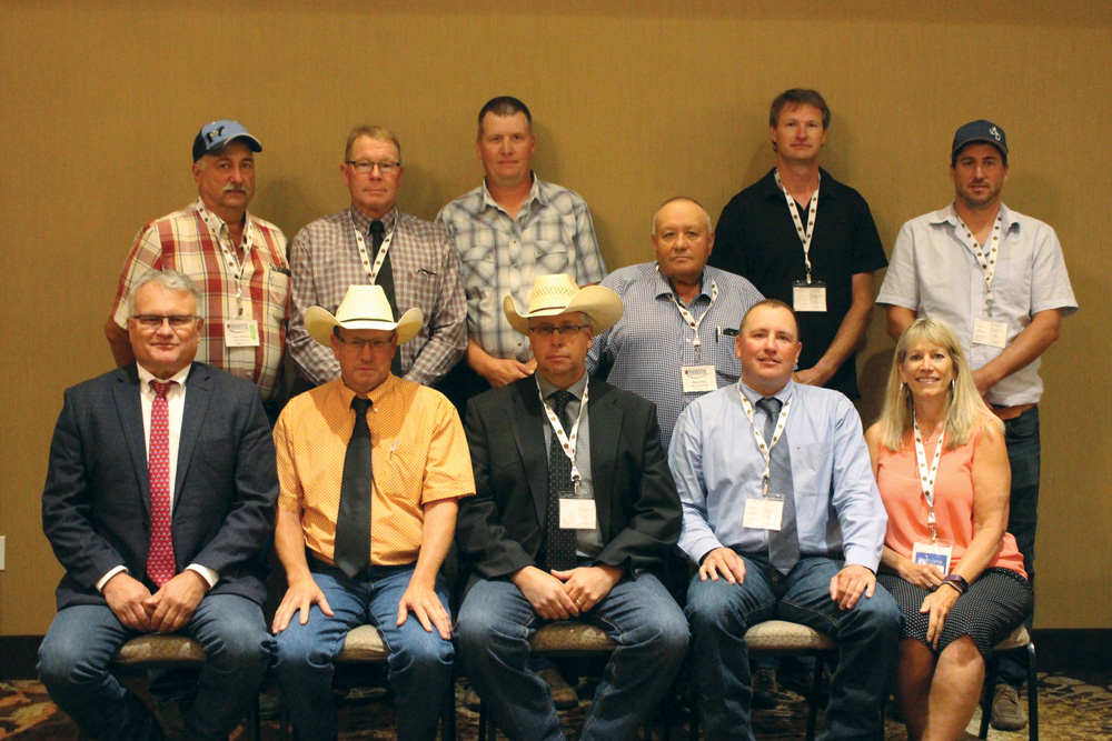 The Canadian Simmental Association board of directors. Back row (l to r): Larry Barkley, Marlin Leblanc, Byron Johnson, Roger Deeg, Frank Robblee, and Francis Gagnon. Front row (l to r): Bruce Holmquist (CSA general manager), Blair McRae, Lee McMillen, Garth Rancier, and Barb Judd (CSA office manager).