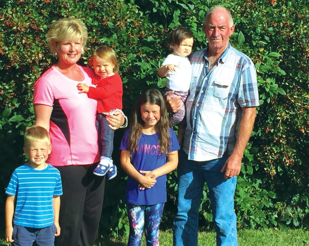 Brian and Connie Chrisp with their grandchildren.