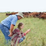 Brian Harper (left) at a grazing workshop touring the high-stock-density grazing experiment on his land north of Brandon, Man. Beef and forage research is in a holding pattern this spring due to the pandemic.