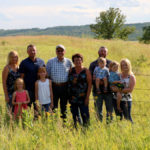 The Nerbas family poses for a family portrait. Left to right: Amber, Hailey, Arron, Emerson, Gene, Cynthia, Shane, Kane, Cash and Sacha.