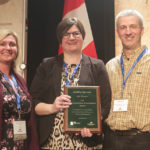 Amanda and Steve Sickle of Sickle Farms receive the Beef Farmers of Ontario Environmental Stewardship Award.