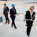 Green Party leader Elizabeth May walks off the set past moderator Paul Wells (l), Conservative leader Andrew Scheer and New Democratic Party (NDP) leader Jagmeet Singh after the Maclean’s/Citytv leaders’ debate in Toronto on Sept. 12, 2019. (Pool photo: Frank Gunn via Reuters)