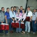Darwin Rosso and Craig Scott, on behalf of the Canadian Charolais Association, presented welcome gifts to the international delegates.