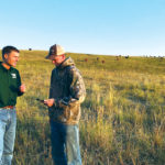 Cannon Smith answers questions on using Herdly from rancher Travis Hartley of Aetna, Alta.