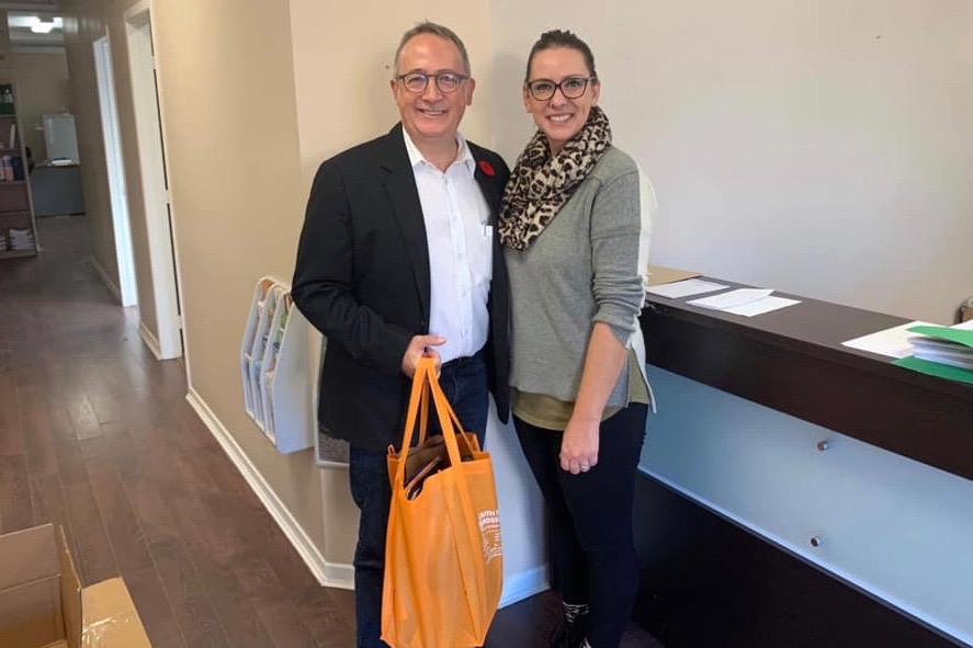 In a photo posted Nov. 6, incoming Berthier-Maskinonge MP Yves Perron meets with the riding’s outgoing NDP MP Ruth Ellen Brosseau to pick up active files from her constituency office. (Facebook)
