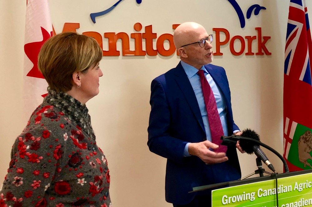 Manitoba Pork Council chair George Matheson and federal Agriculture Minister Marie-Claude Bibeau announce funding for a two-year pilot insurance program for Manitoba hog producers. (Dave Bedard photo)
