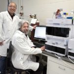 Researchers Lipu Wang and Randy Kutcher have come up with a quick, accurate way to measure DON in cereal crops. (Photo: University of Saskatchewan)