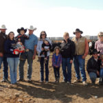 Three generations of the Stokke family take a break from working cattle for a picture. Randy and Terry are happy to see that the land that has supported their family will continue to do so into the future.