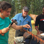 Students learning about equipment maintenance and repair. Pictured from left to right: Magalie Steiner, instructor Lynn Bonner and Majeed Nashiru.