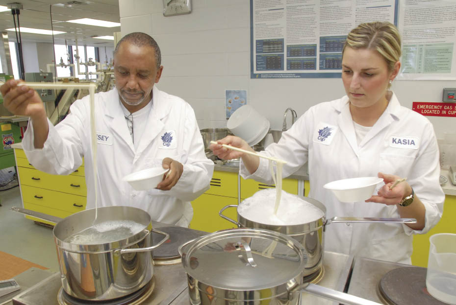 Cigi staff evaluate wheat flour for use in oriental noodles. (Cigi photo)
