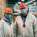 Masks, face shields and plastic barriers between work stations are examples of the health and safety protocols at Cargill to protect workers from COVID-19.
