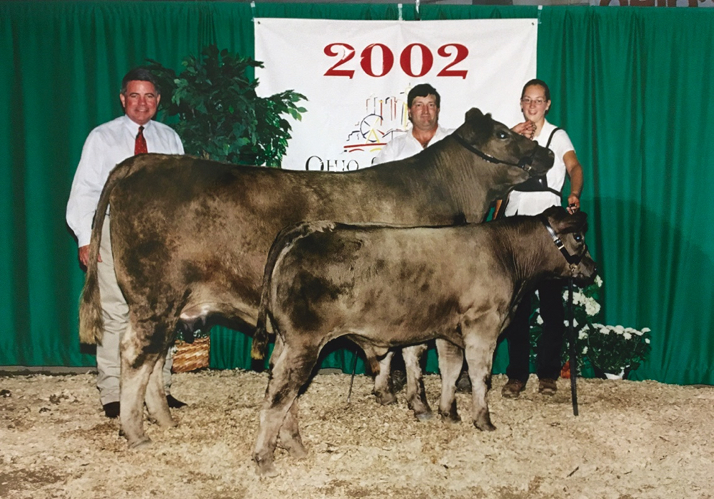Brad Robart and daughter Susan at the 2002 Ohio State Fair with his prize Murray Grey cow-calf pair.