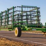 John Deere says its new line of heavy harrows features a quick folding and unfolding sequence to help farmers move more quickly between fields. (Deere.com)