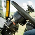 A side view of Trimble’s EZ-Pilot Pro guidance system mounted on a tractor’s steering column. (Agriculture.trimble.com)