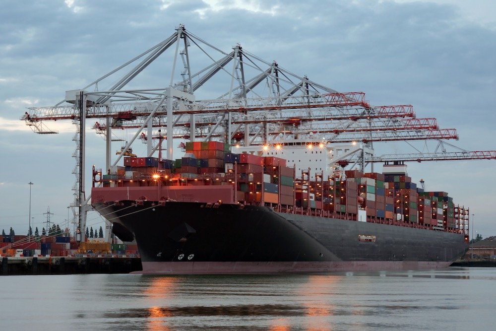 File photo of a container vessel being unloaded at a U.K. port. (Sterling750/iStock/Getty Images)
