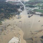 Floodwaters cover the Trans Canada Highway near Abbotsford, B.C. in an aerial view taken Nov. 16, 2021. (Photo courtesy BC Hydro via Reuters)