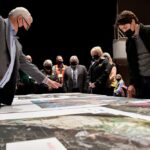 Prime Minister Justin Trudeau is shown maps by Abbottsford, B.C. Mayor Henry Braun during a visit to the city on Nov. 26, 2021. (Photo: Reuters/Jennifer Gauthier)