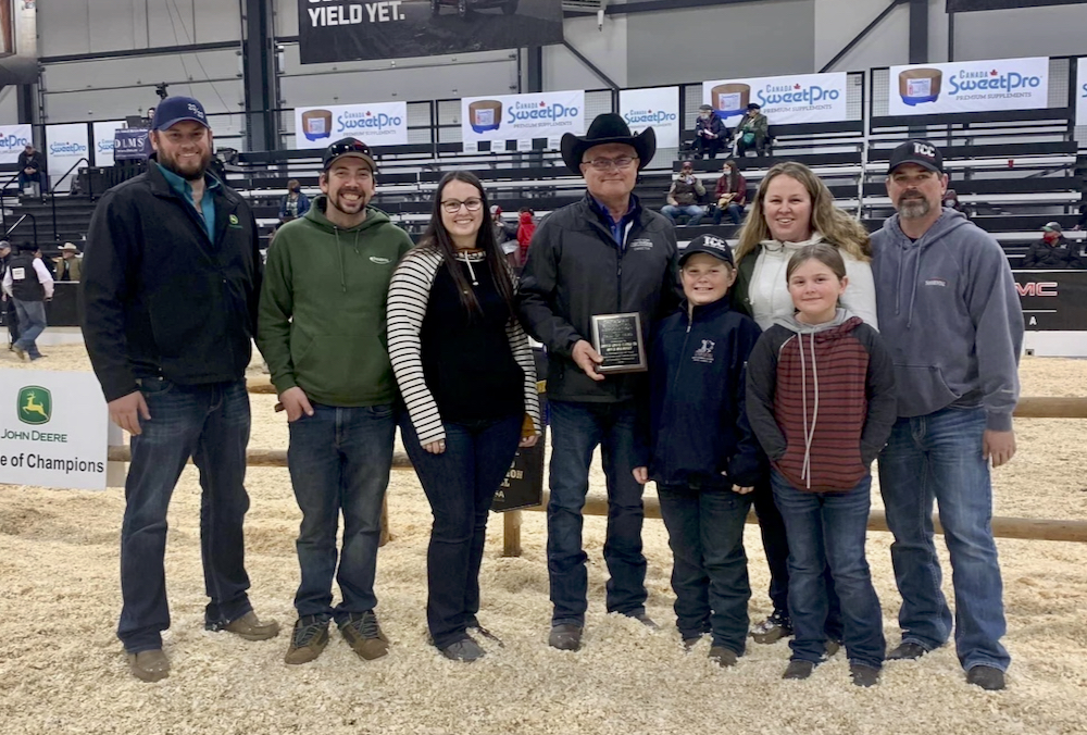 Bruce Holmquist (centre) and his family.