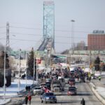 Protestors’ vehicles block the route leading from the Ambassador Bridge, linking Detroit and Windsor, on Feb. 8, 2022. (Photo: Reuters/Carlos Osorio)