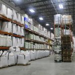Totes of seed lined up and ready for shipment at Union Forage’s warehouse in south Calgary.