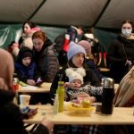 Refugees from Ukraine wait at the Ukrainian-Slovakian border on March 4, 2022, following Russia's invasion of Ukraine which began on February 24, 2022.