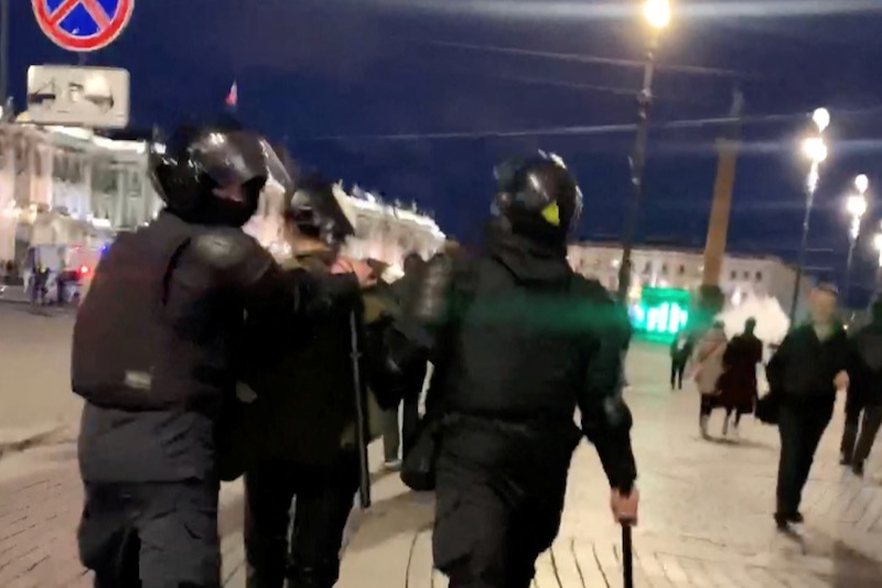 Security forces detain a demonstrator during a protest on Sept. 21, 2022 in St. Petersburg against a mobilization of reservists ordered by Russian President Vladimir Putin. (Social media video screengrab obtained by Reuters)
