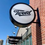 Signage outside a Tweed cannabis store in Winnipeg’s Osborne Village, roughly 60 metres west of the high-density neighbourhood’s Tokyo Smoke store. (Dave Bedard photo)