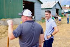 Andre Fortin, shown here at right in September at a community fair at Shawville, Que., about 75 km northwest of Ottawa, is the Quebec Liberals&#8217; new critic for agriculture and health. (Andre Fortin via Facebook)
