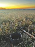 A soil infiltration ring, shown here on a producer&rsquo;s field in the Peace region, is used to measure how quickly rain water infiltrates on a field.