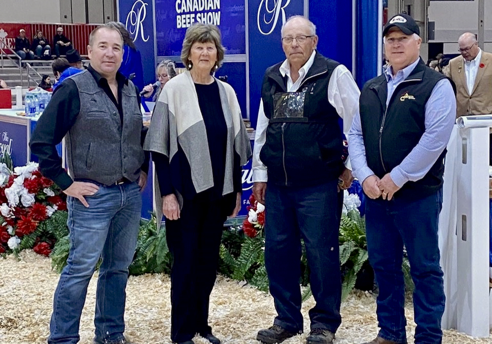 Miles Immerkar (Canadian Angus Association CEO), Sylvia Jackson, Bill Jackson and Canadian Angus Association president Graham McLean.