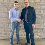 Pictured is Cameron McTaggart Scholarship recipient Owen Dudgeon (left) and Ontario Angus Association Don McNalty (right). Jackson Corner and Nathan Dawe also received Cameron McTaggart scholarships.