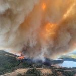 A smoke column rises from a wildfire on May 4, 2023 near Lodgepole, Alta., about 30 km southwest of Drayton Valley. (Photo: Alberta Wildfire handout via Reuters)