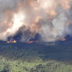 Smoke rises from a wildfire southeast of Fort Nelson in northeastern B.C. on May 27, 2023. (Photo: B.C. Wildfire Service/Handout via Reuters)