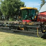 A New Holland Speedrower 260 Plus windrower unit, outfitted with Honey Bee’s WSC30 header. (Media.CNHIndustrial.com)