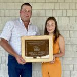 Albert Rimke presents the Bob Gordon Memorial Over- all Grand Aggregate award to Heidi McFadden.