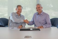 Rob Painter (l) and Eric Hansotia, CEOs of Trimble and Agco respectively, agreed on Sept. 28, 2023 to combine their precision ag arms into a new joint venture. (Trimble via PRNewswire)