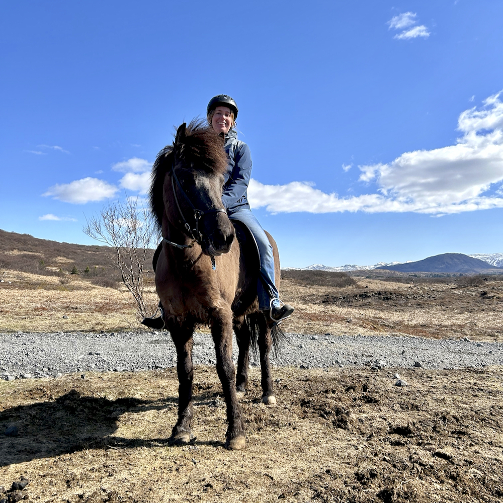 Canadian Cattlemen editor Lisa Guenther riding horseback in 2023.