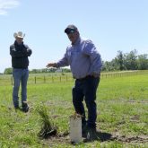 Jeff Schoenau speaks at the Livestock and Forage Centre of Excellence field day last June, while Bart Lardner looks on.