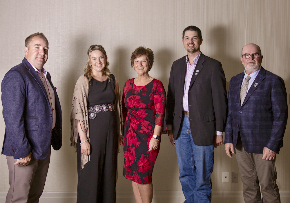 L to R: Myles Immerkar, Kaitlynn Bolduc (Outstanding Young Angus Breeder), Belinda Wagner, Shawn Birmingham and Ronnie Ford.