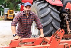 Farmer and red tractor