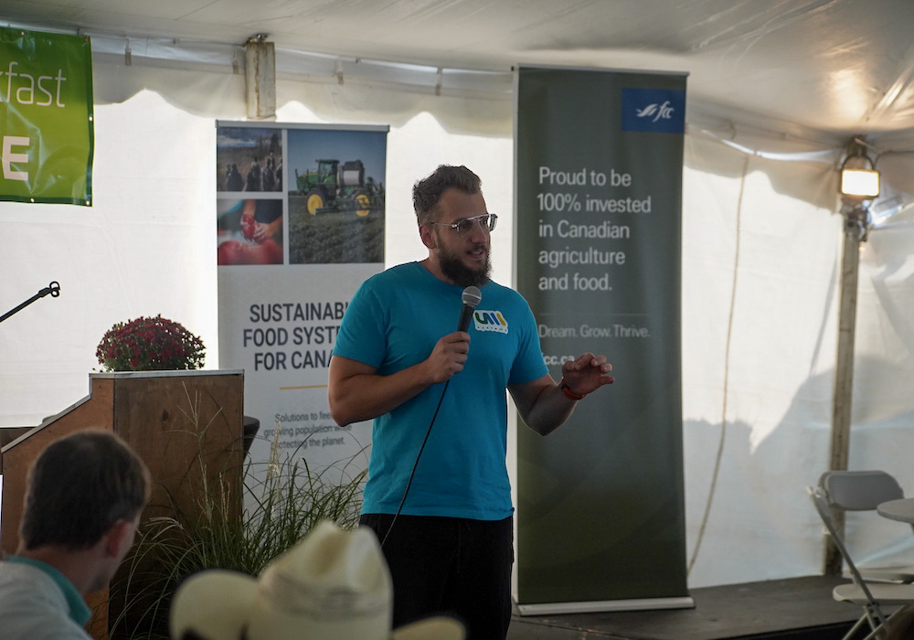 Seva Lisouski speaks at Canada’s Outdoor Farm Show 2024. Photo: Stew Slater

