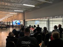 Launch attendees watch the first episode of the Western Producer’s documentary series, Welcome to the Farm Show, which was shown during Canadian Western Agribition.